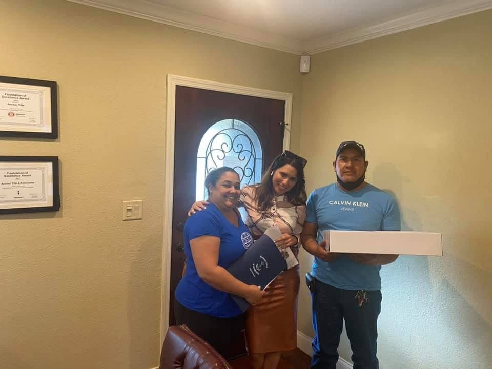 Happy clients after real estate closing